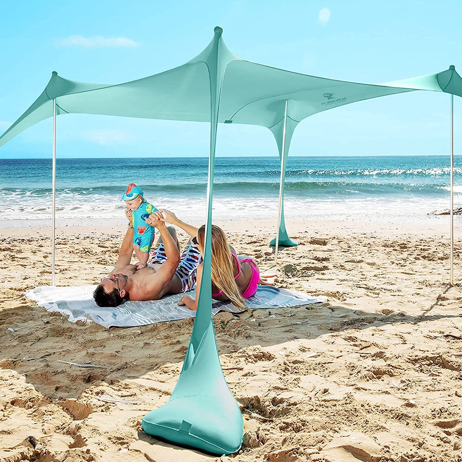 Beach supplies (towels, tent, umbrellas & chairs) included - no need to rent beach service!