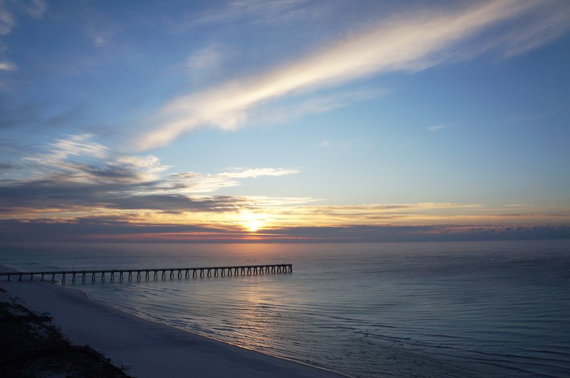 Greet the Sunrise Over Navarre Pier from Your Spacious Balcony