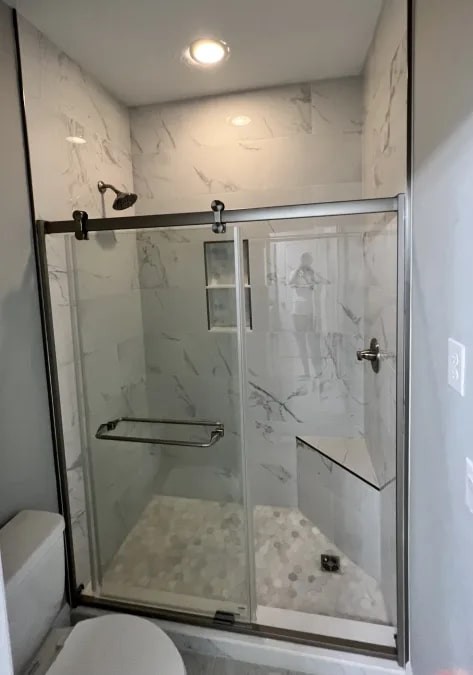 Downstairs bathroom just remodeled in 2022 with walk in shower