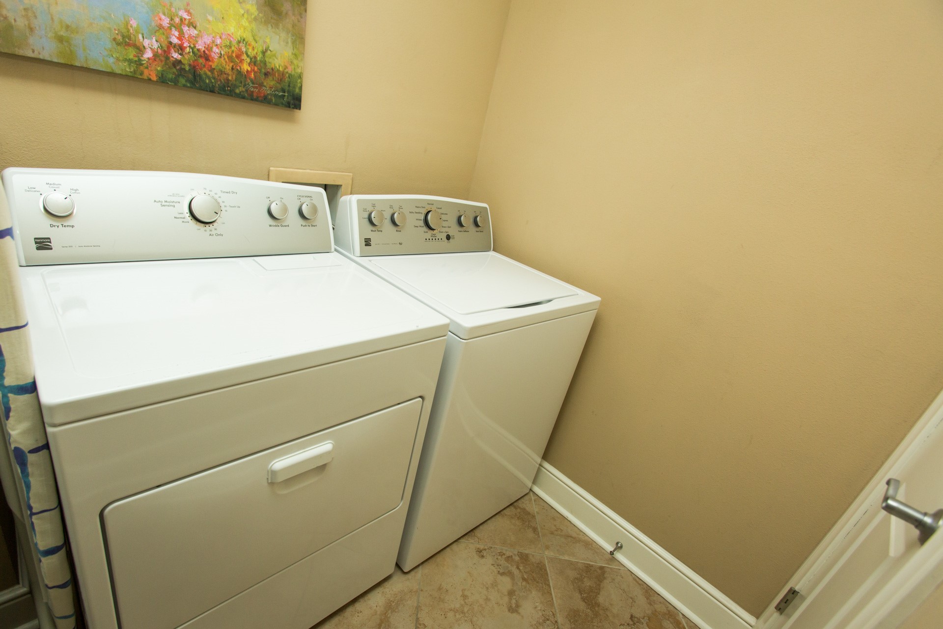 Utillity room with full size washer and dryer