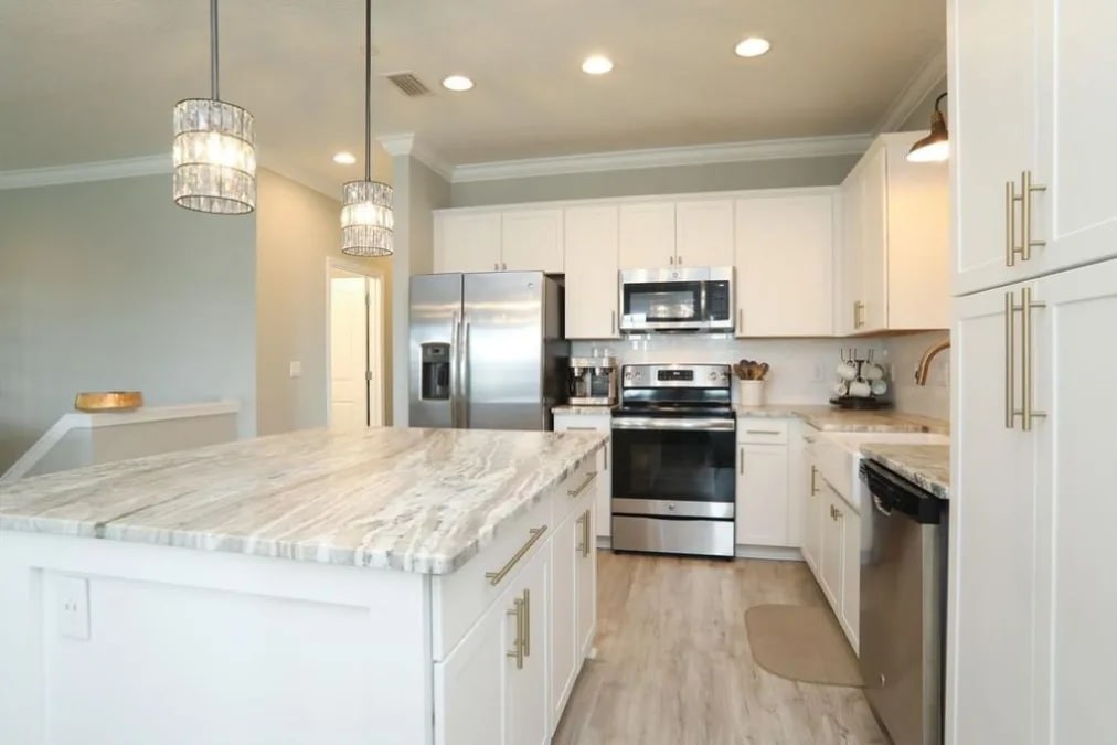 Stainless steel appliances and quartz countertops