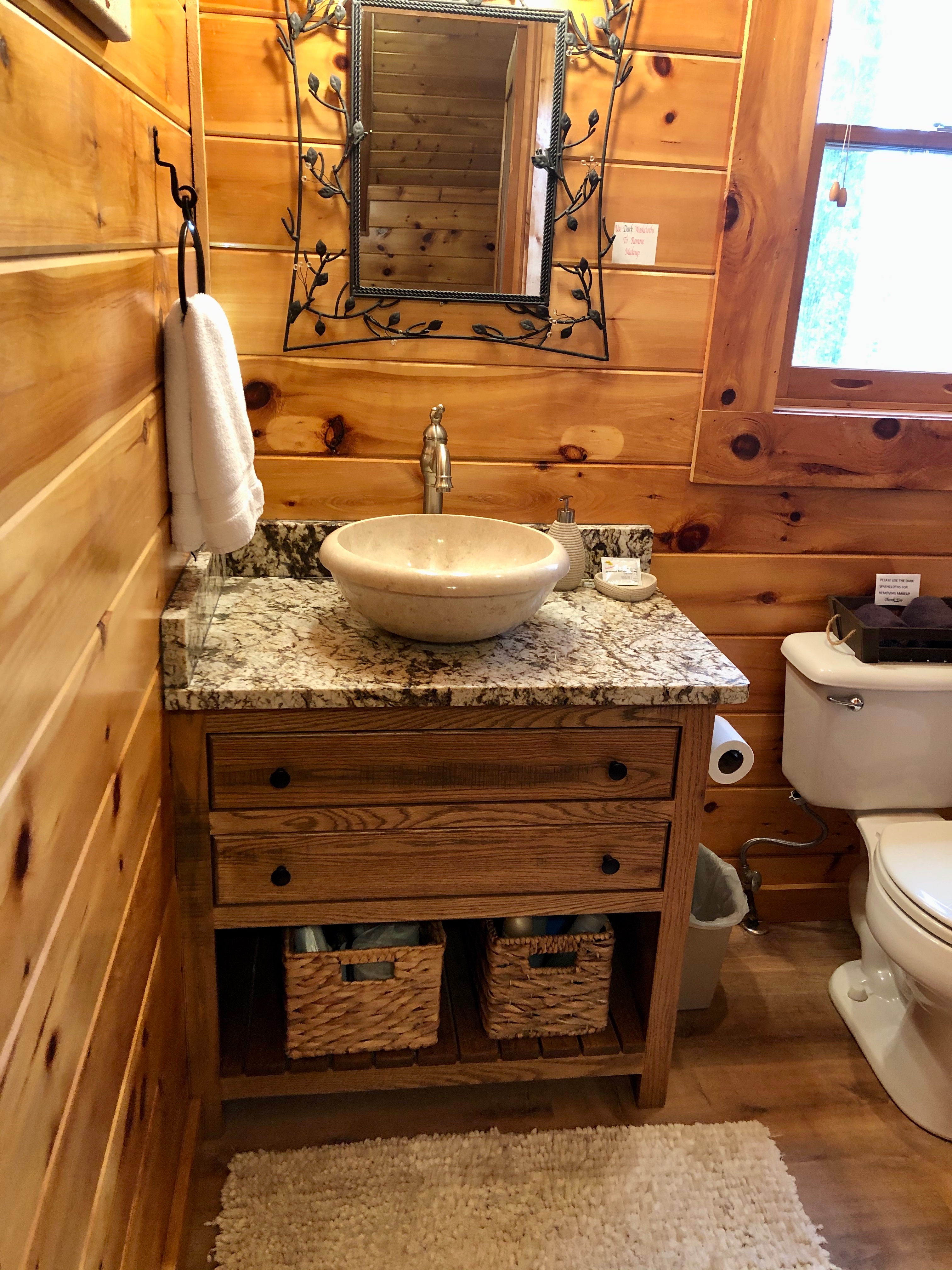 Remodeled upstairs bathroom (2/21) with locally made vanity and granite