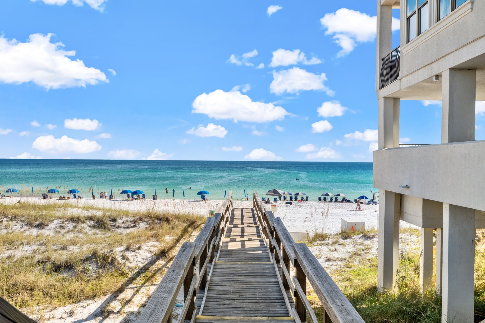 Private beach access to guests via gate, step out to soft white sand and the emerald waters of the gulf