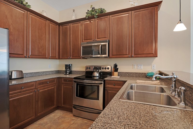 Kitchen features granite counter tops