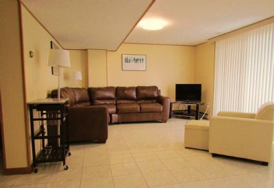 Living area - lower level. Walk to beach and lake