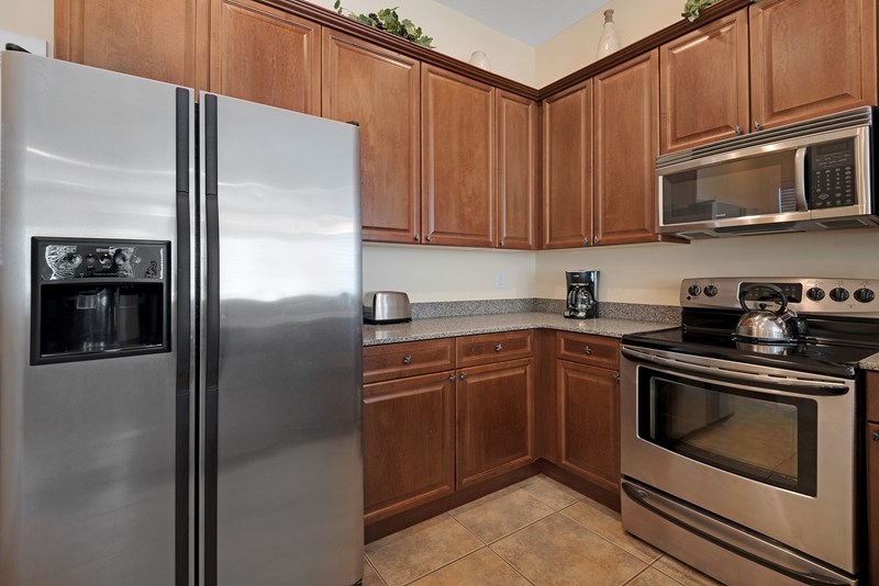 Kitchen features stainless steel appliances